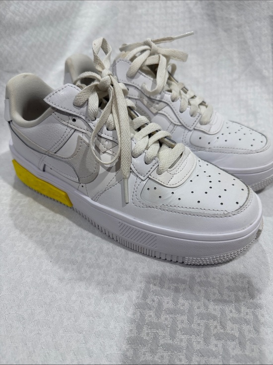 Nike Shoes - Nike White Leather Low-Top Sneakers with Yellow Heel Tab